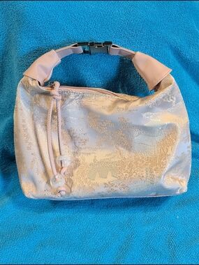 Elegant Pink Shoulder Bag with Bead Tassel